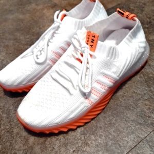 White and bright orange shoes